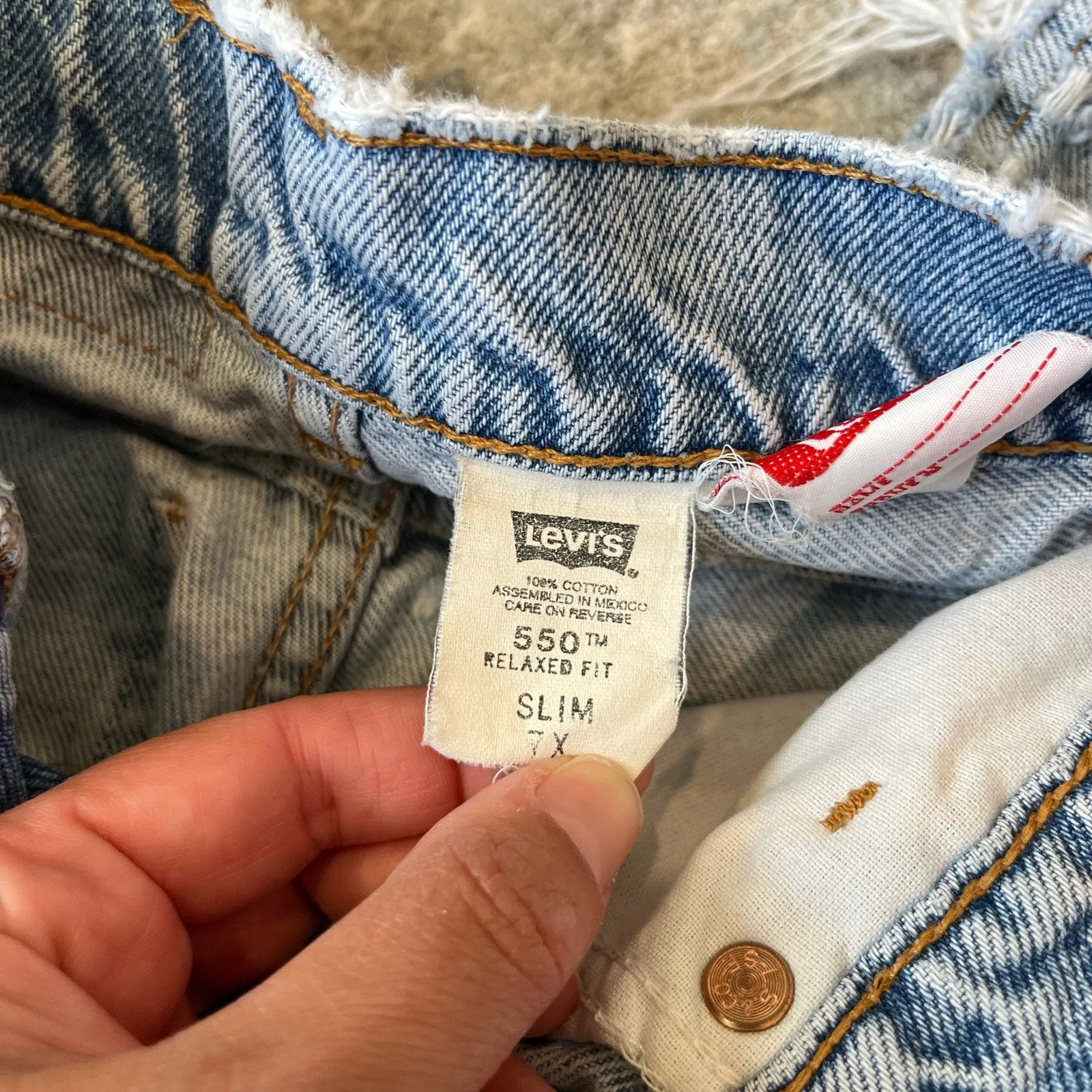 Vintage Levi's 550 Relaxed Fit Slim Orange Tab Jeans 7